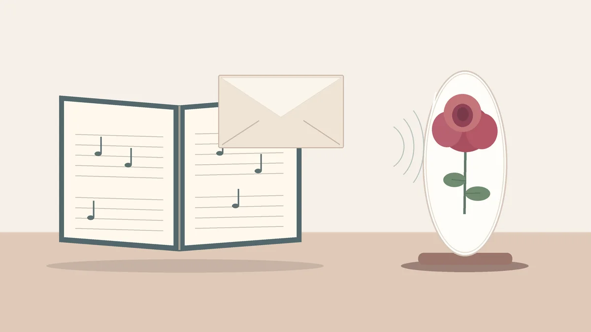 Conceptual music score and blank thank-you card beside a covered preserved rose display
